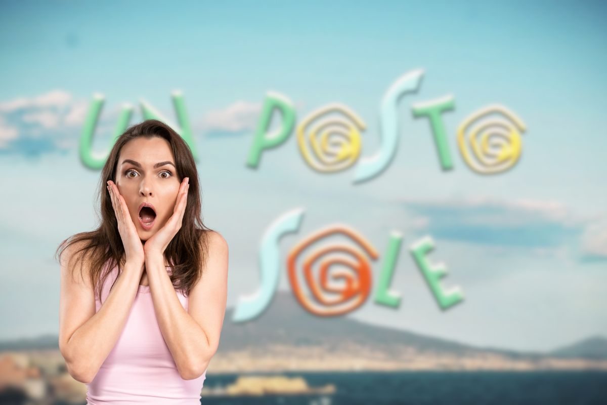 logo di un posto al sole e in primo piano una donna stupita